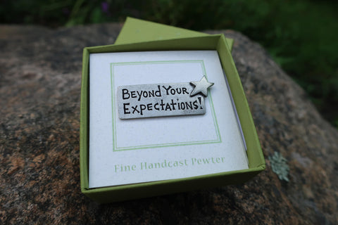 Beyond Your Expectations Lapel Pin