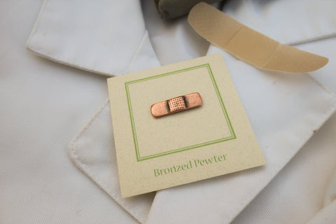 Band-Aid Copper Lapel Pin