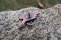 Cannon Copper Lapel Pin