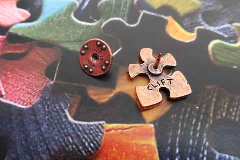 Puzzle Piece Copper Lapel Pin