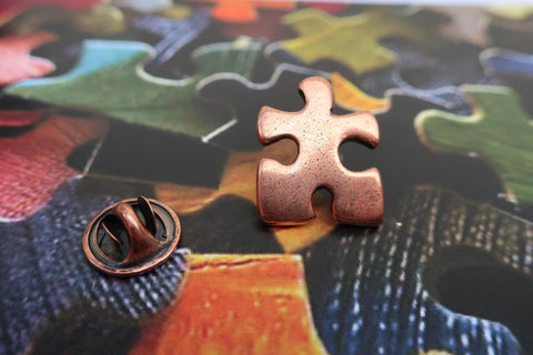 Puzzle Piece Copper Lapel Pin
