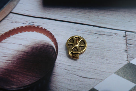 Film Reel Gold Lapel Pin