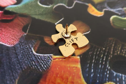 Puzzle Piece Gold Lapel Pin