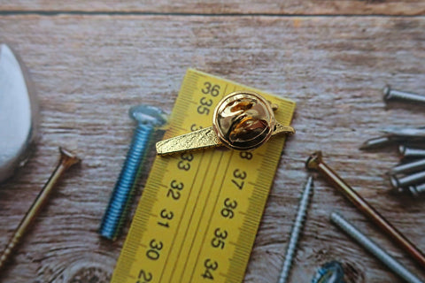 Saw Gold Lapel Pin