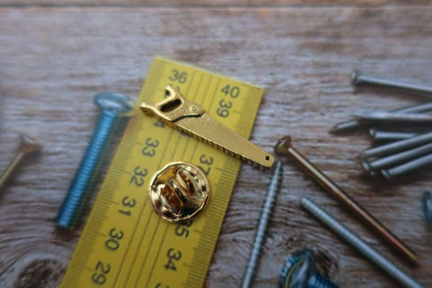Saw Gold Lapel Pin
