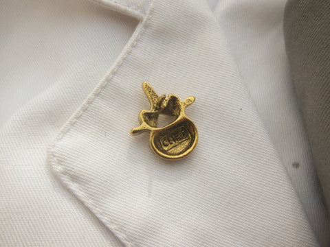Vertebra Gold Lapel Pin