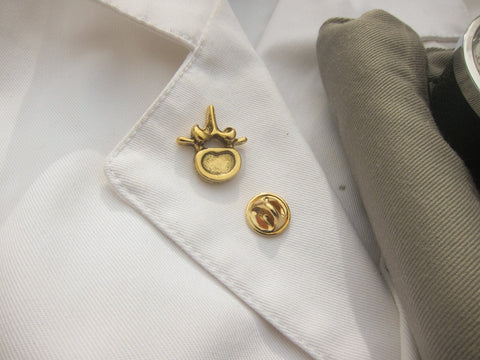 Vertebra Gold Lapel Pin