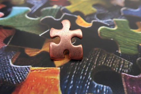 Puzzle Piece Copper Lapel Pin