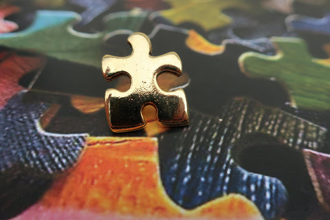 Puzzle Piece Gold Lapel Pin