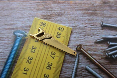 Saw Gold Lapel Pin