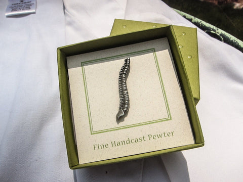 Spine Lapel Pin