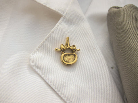Vertebra Gold Lapel Pin